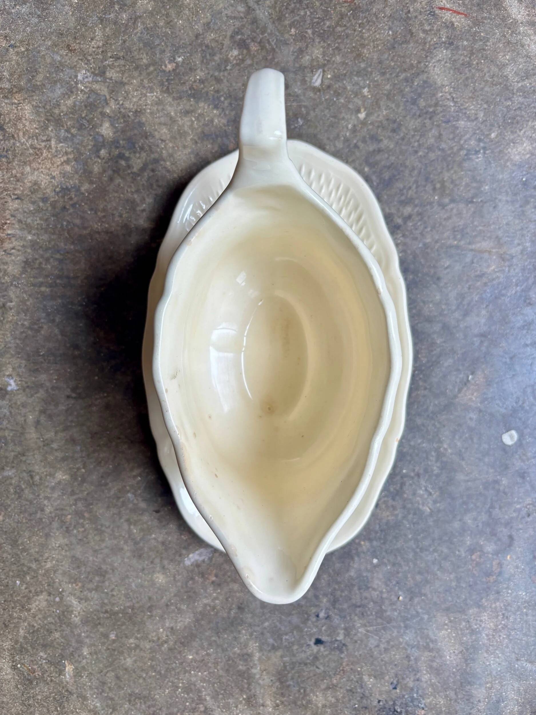 Gien earthenware sauceboat, "Pont aux choux" service