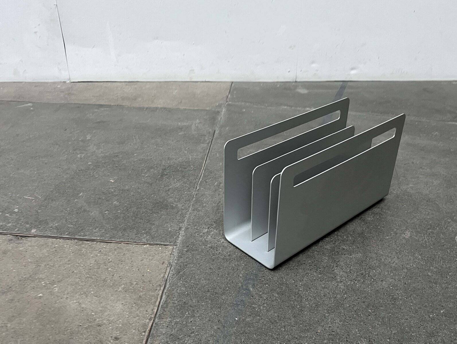 Minimalist aluminium magazine rack by Norman Foster for Helit, Germany, 1990s.