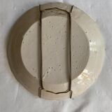 Plate of Nevers in earthenware late eighteenth century decoration of crest to flower