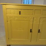 Yellow wooden chest of drawers