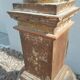 Large antique church candlestick in carved wood transformed into a lamp.