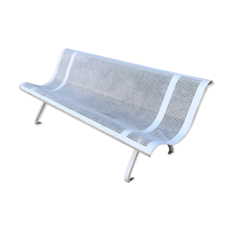 Old garden bench in perforated metal