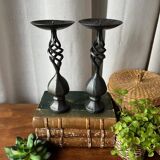 Pair of wrought iron candlesticks, black patina