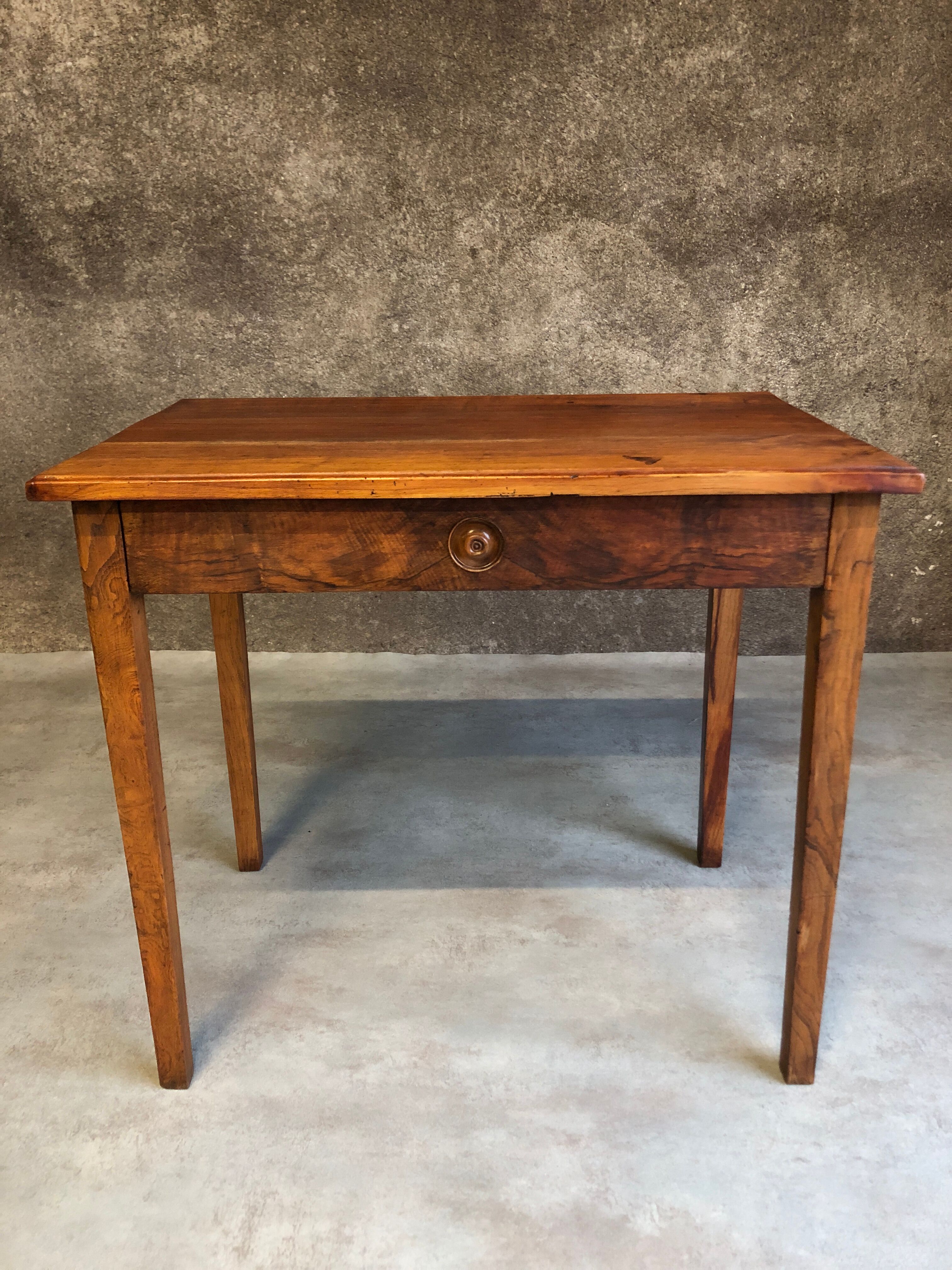 Walnut wood desk with a drawer