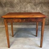Walnut wood desk with a drawer