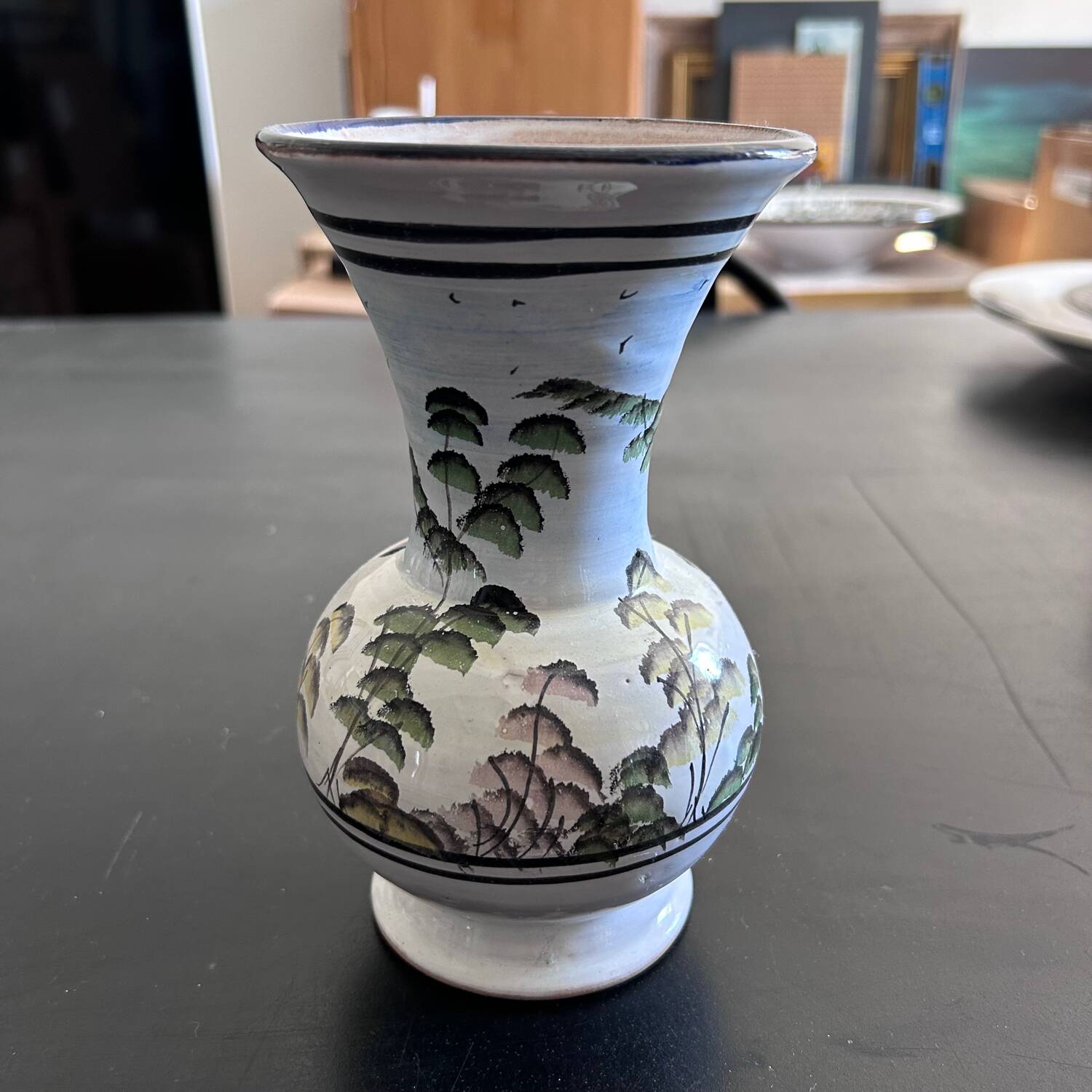 White vase with plant decoration