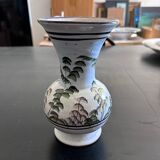 White vase with plant decoration