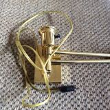 Wall lamp in gold metal