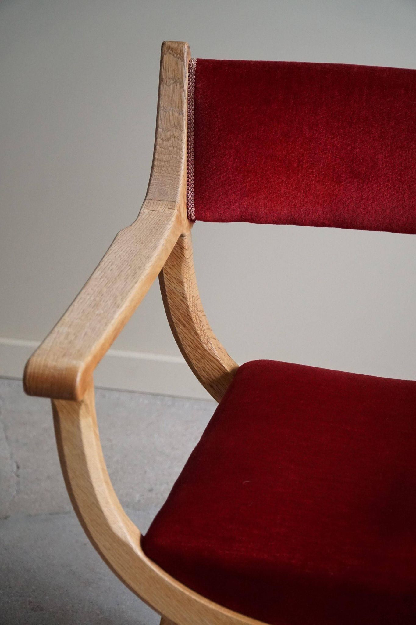 Henning Kjærnulf, Oak and velvet armchair, Model "Kurul", Mid-century, 1960s
