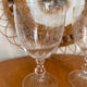 Set of two engraved glass wine glasses
