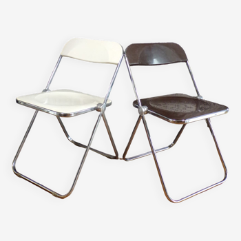 Duo of white and brown Piretti plia chairs