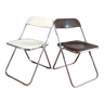 Duo of white and brown Piretti plia chairs