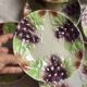 Set of eight flat dessert plates in barbotine earthenware with grape decoration – circa 1900.