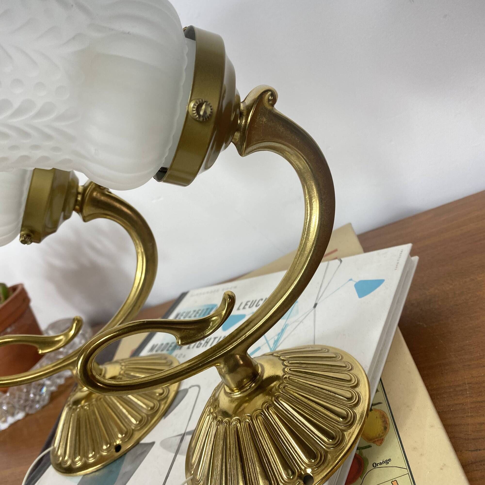 Pair of antique wall sconces with swan neck in brass, glass tulip.