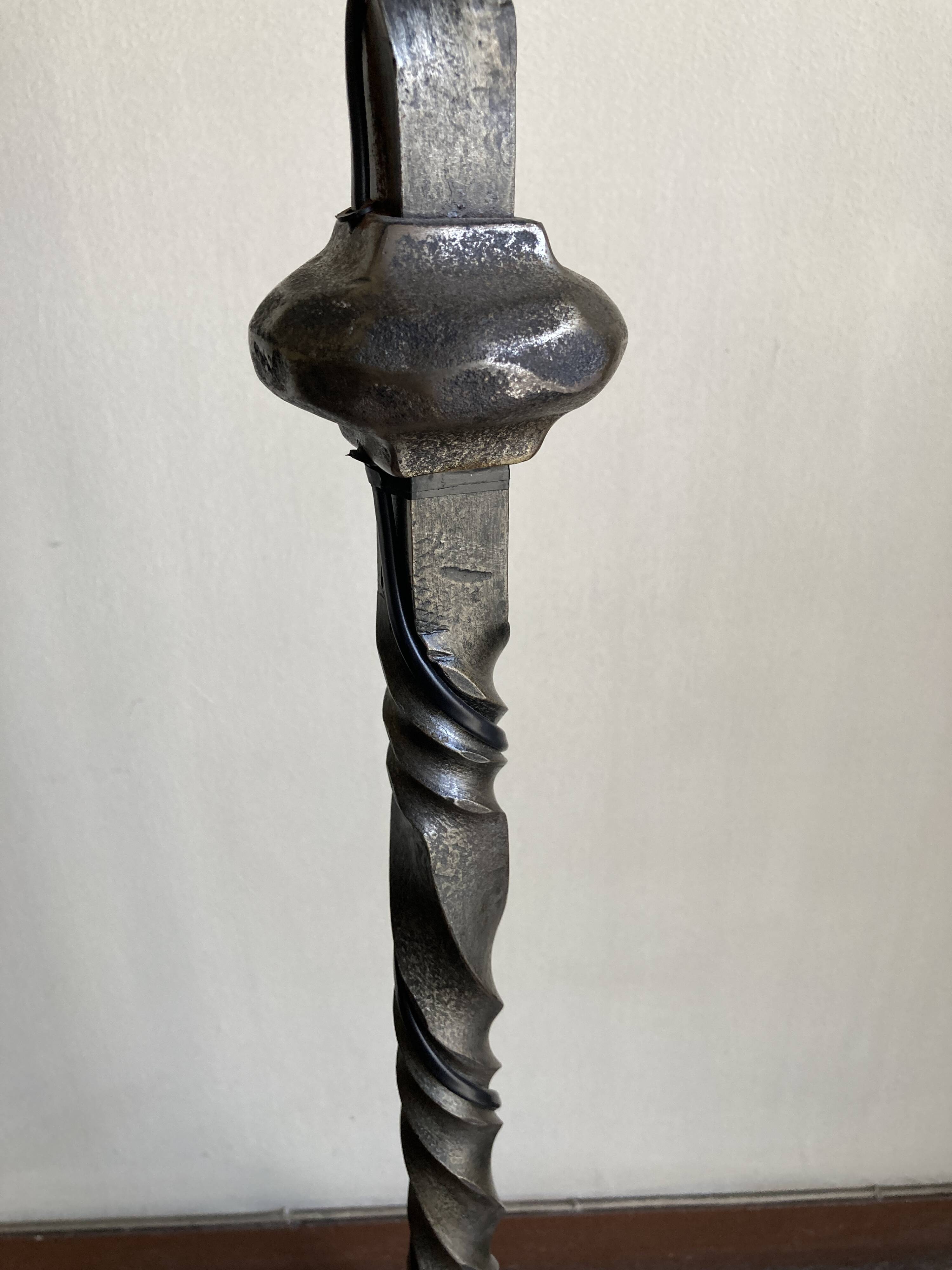 Floor lamp in beaten iron and bronze Artisans de Marolles 1960