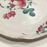 Eastern earthenware plate decorated bouquet of flowers