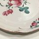 Eastern earthenware plate decorated bouquet of flowers