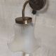 Swan neck wall lights in brass and glass - mid 20th century.