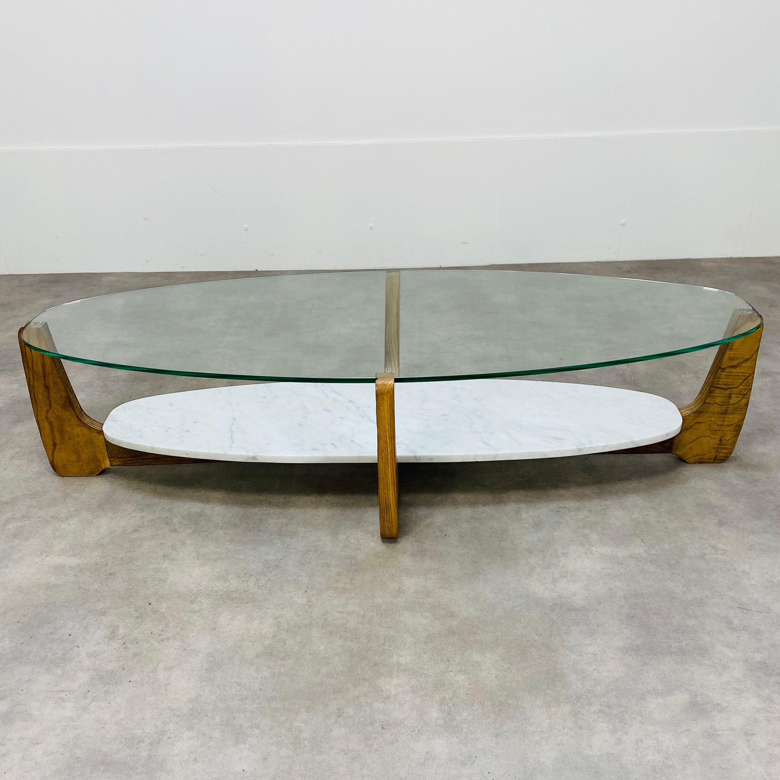 Scandinavian coffee table Hugues Poignant oval wood marble glass