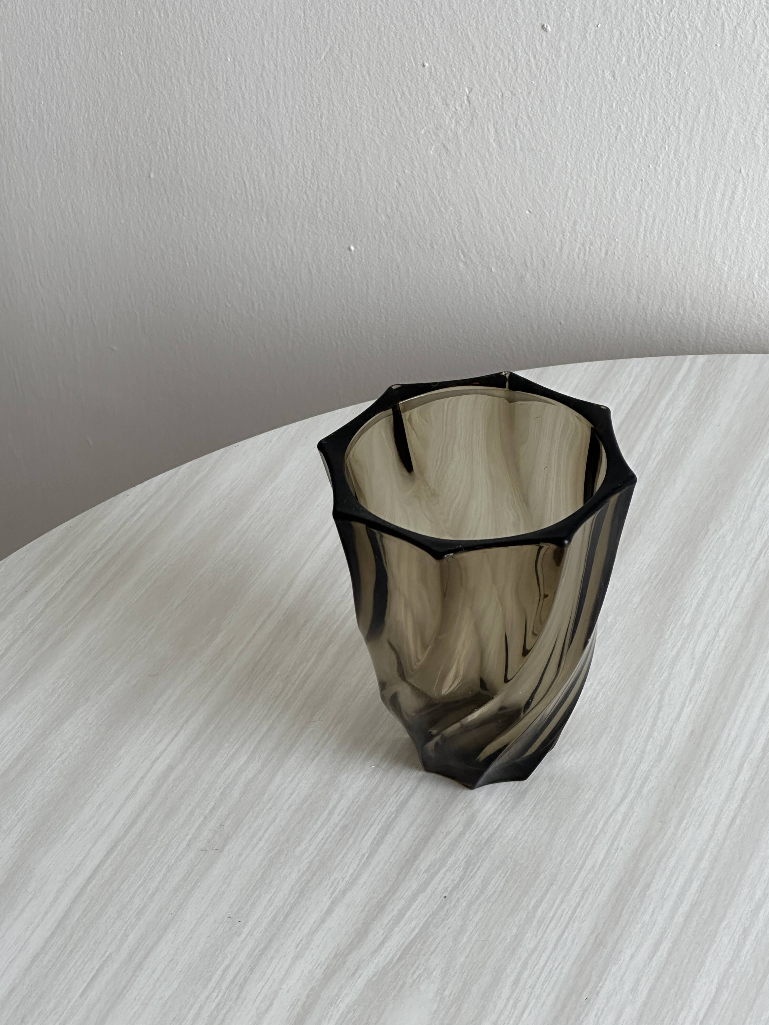 Smoked glass vase with twisted design