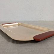 Plates and a brass and Bakelite cut by PM Italy, Italy around 1970.