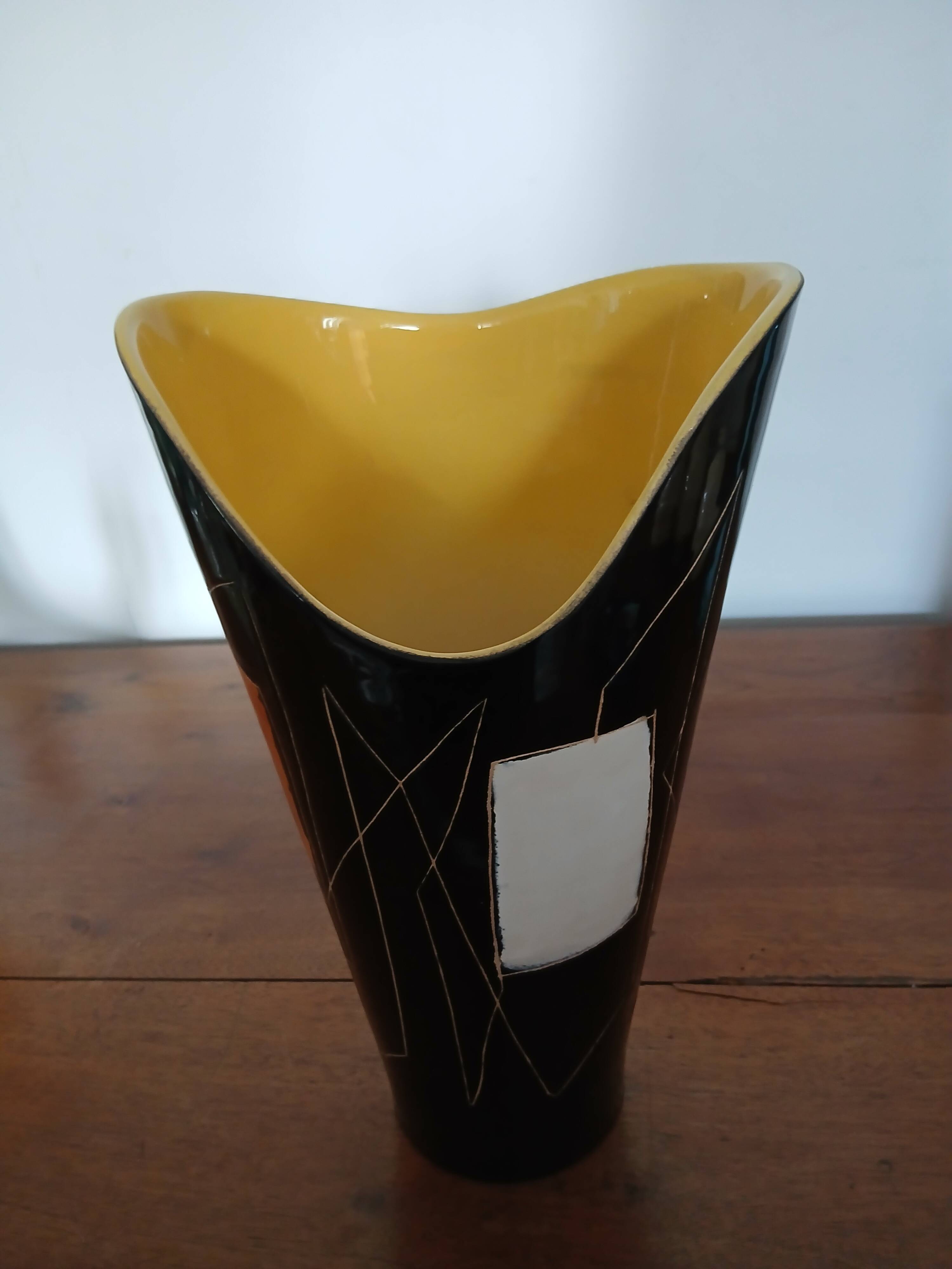 Yellow and black ceramic vase