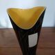 Yellow and black ceramic vase