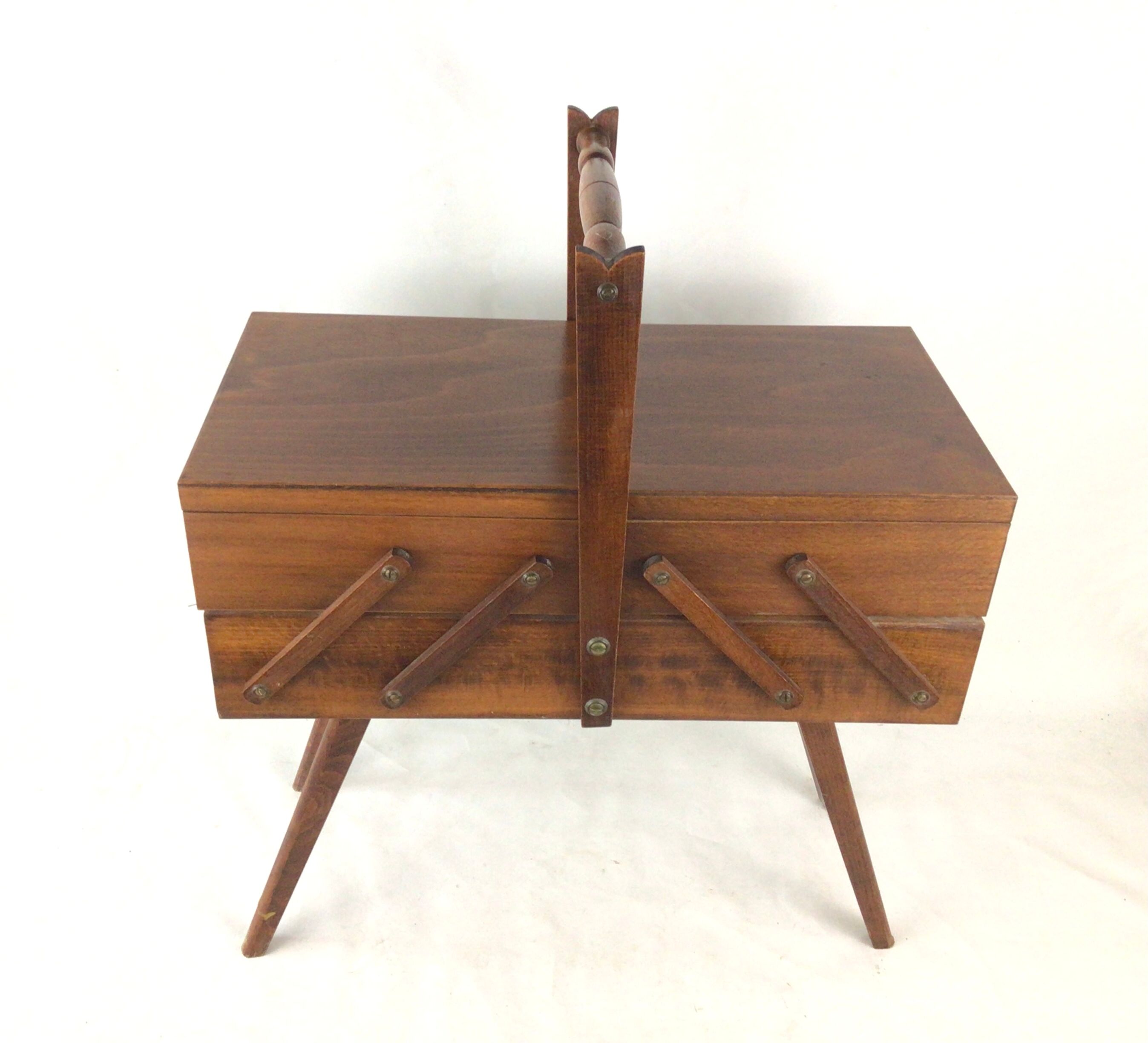 Worker on wooden compass feet