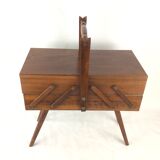 Worker on wooden compass feet