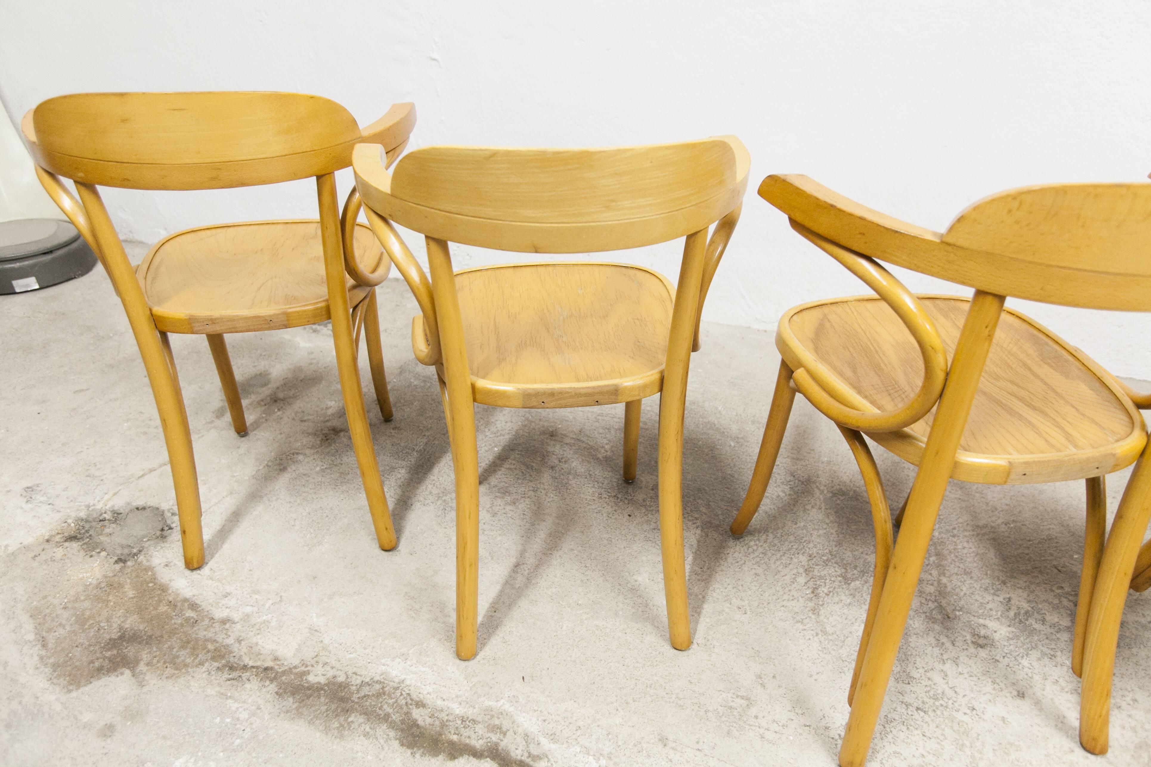 Set of 4 bistro armchairs with armrests from the 1960s.