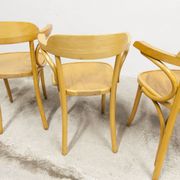 Set of 4 bistro armchairs with armrests from the 1960s.