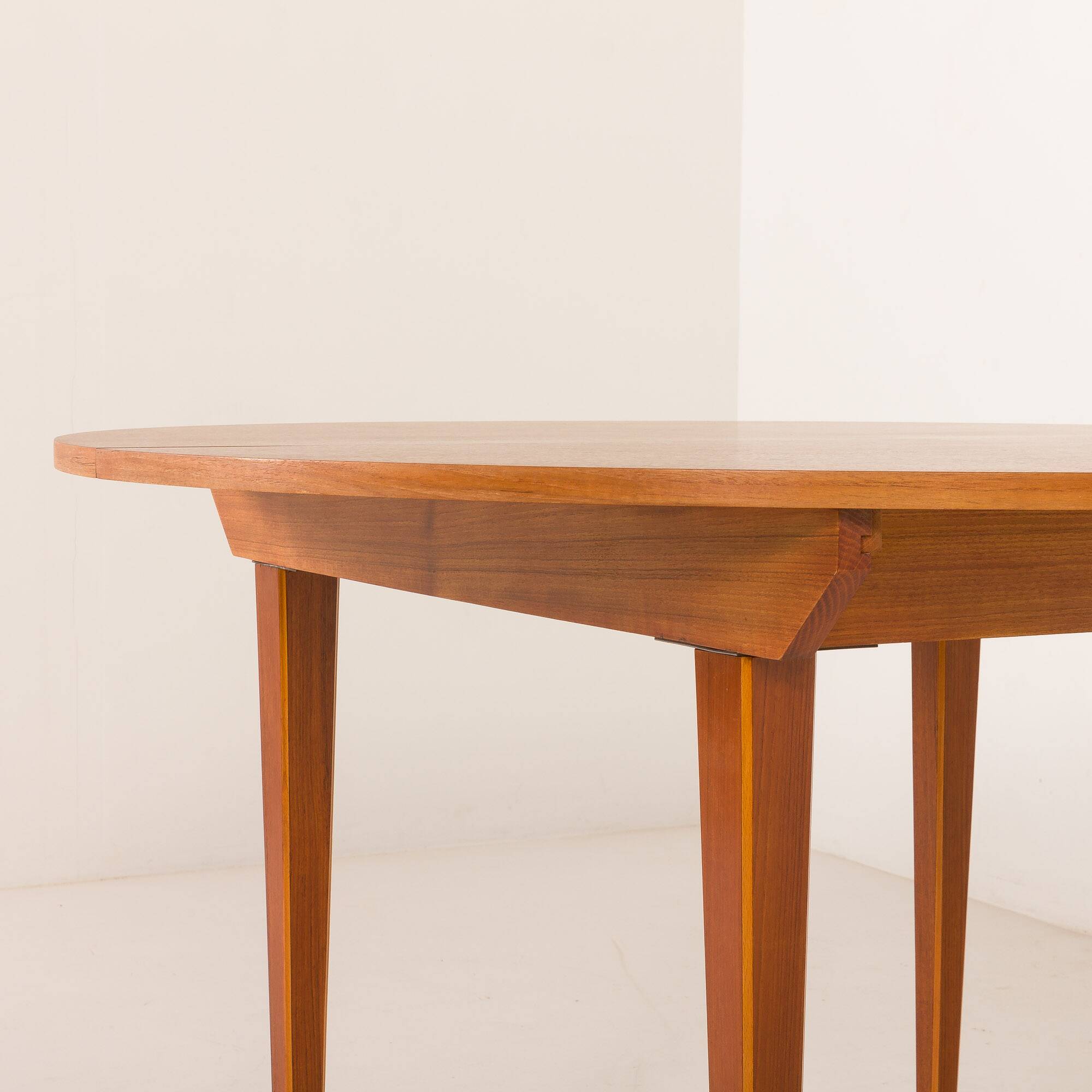 Scandinavian round teak table with hidden extension, 1970s