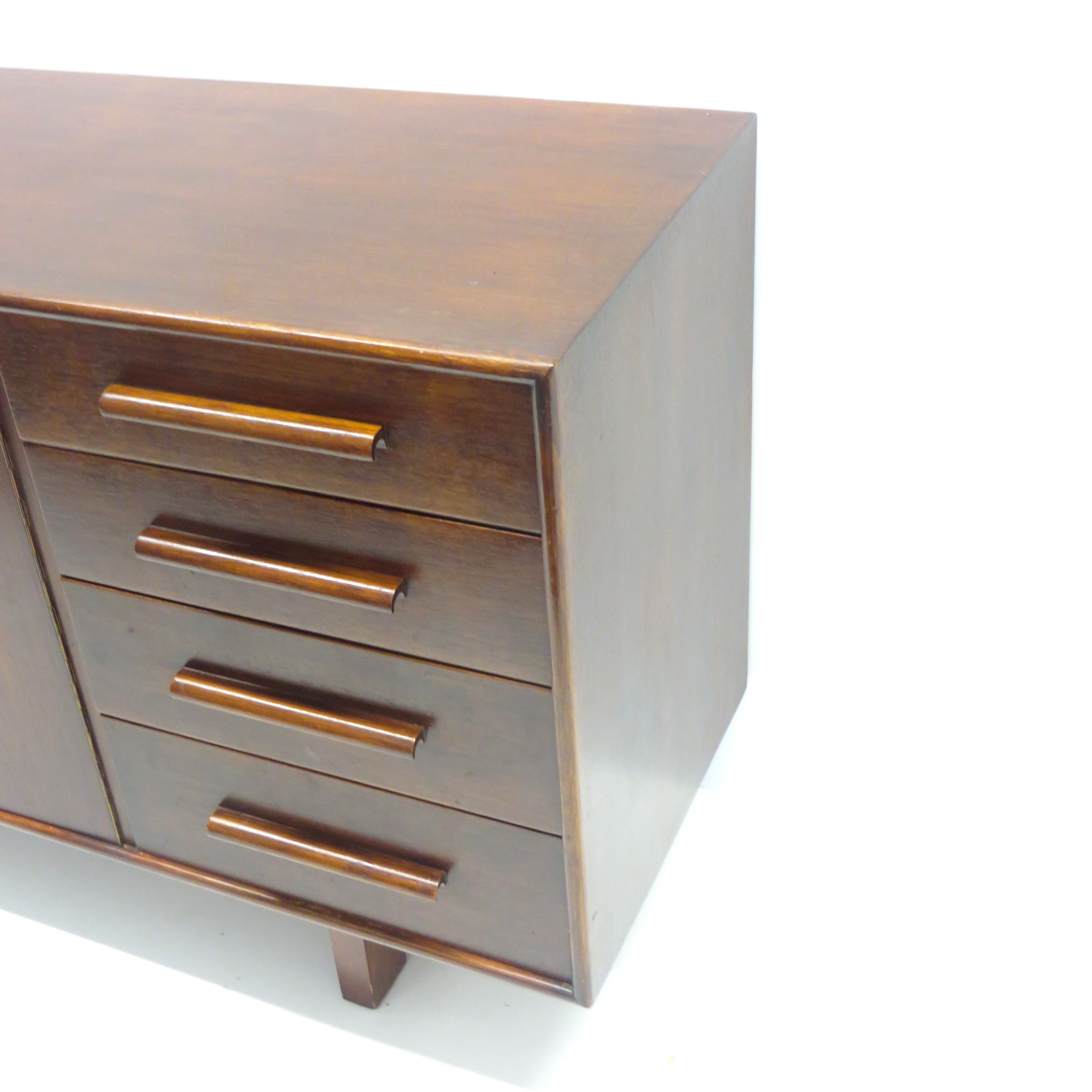 Vintage sideboard with 4 drawers and 2 doors made in the 60s