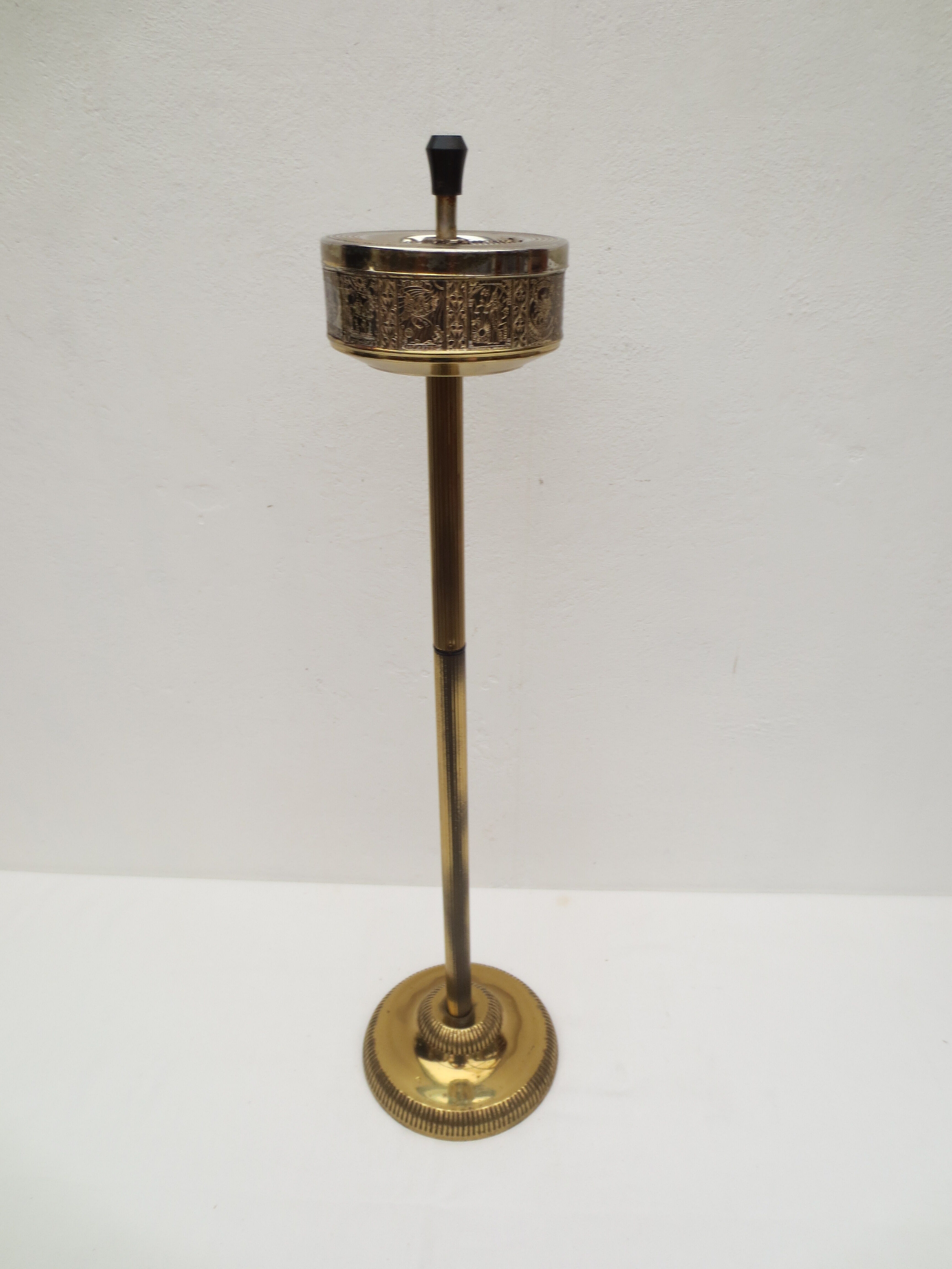 Old ashtray on foot year 50 in gilded brass