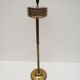 Old ashtray on foot year 50 in gilded brass