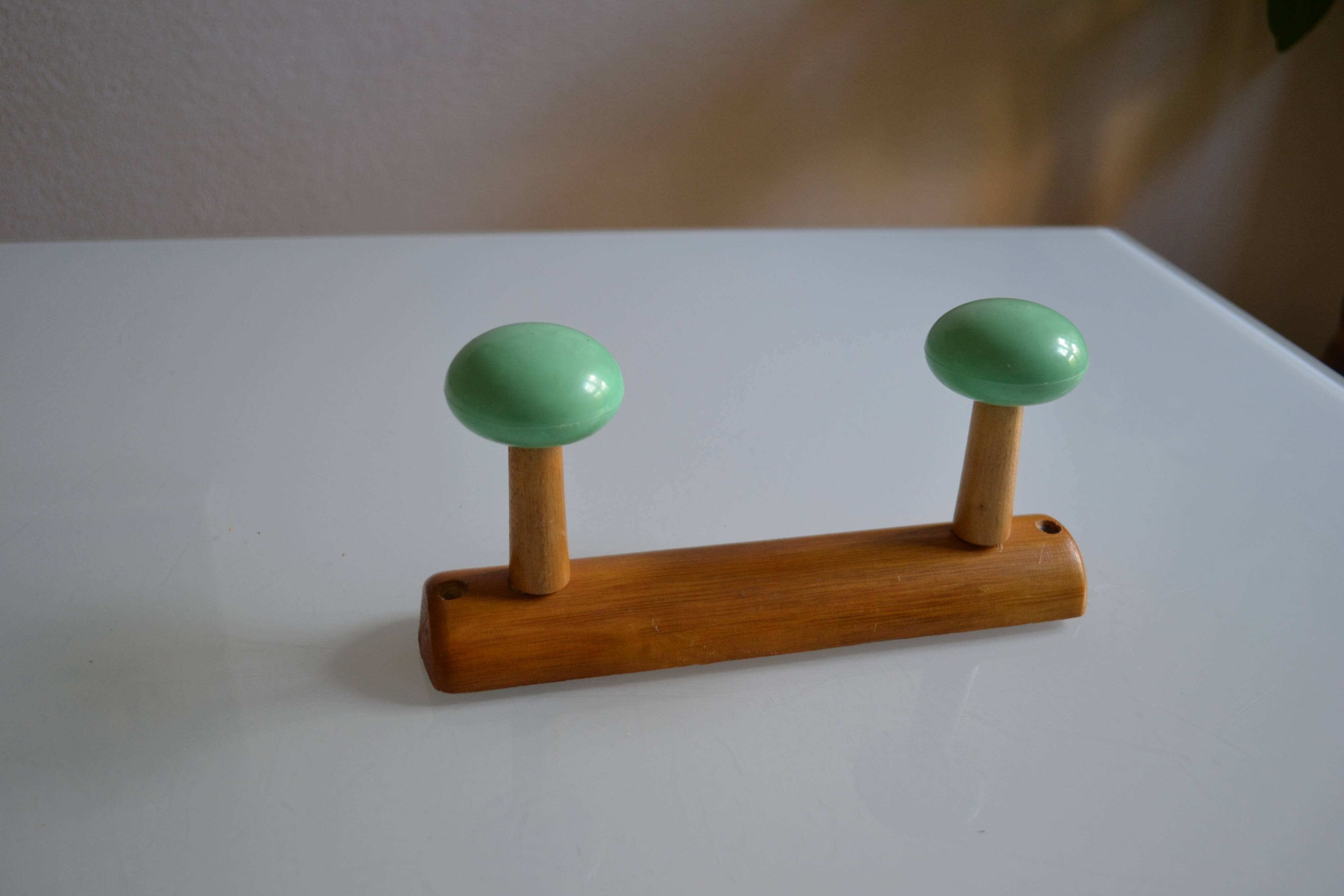 Wall coat rack with 2 hooks, wood and plastic, 60s style.