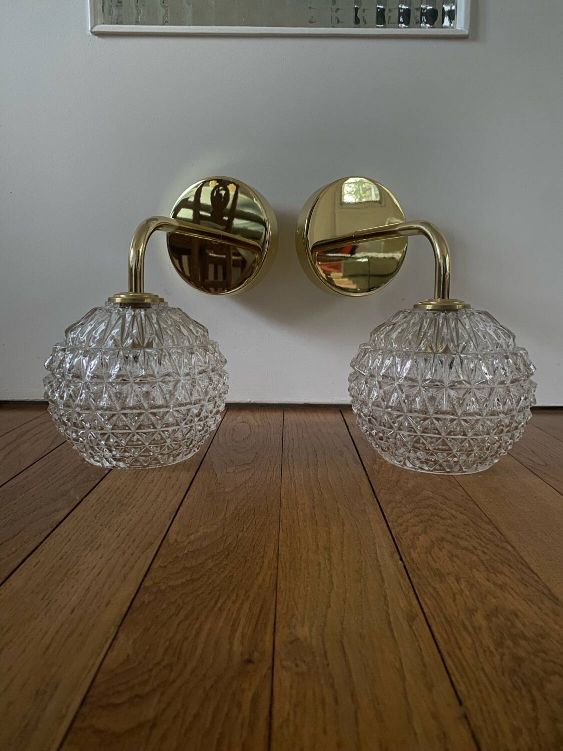 Pair of wall lights with vintage globes