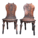Pair of antique carved wooden chairs