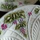 11 dessert plates in slip decorated with grapes Les salins