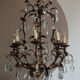 Lustre Avec les feuilles dorés et plein des cristal 30