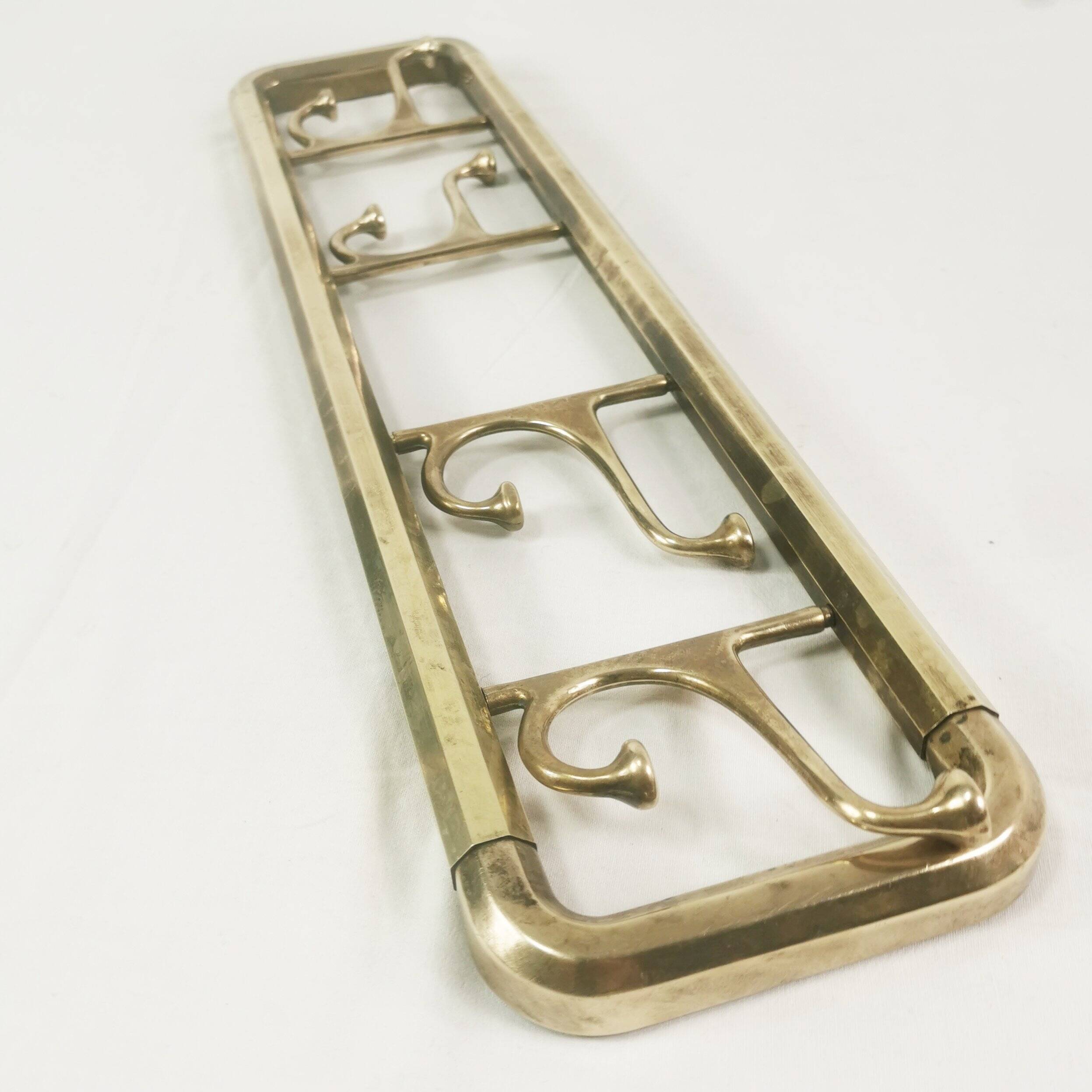Art Deco brass wall hanger, Austria, 1940s.