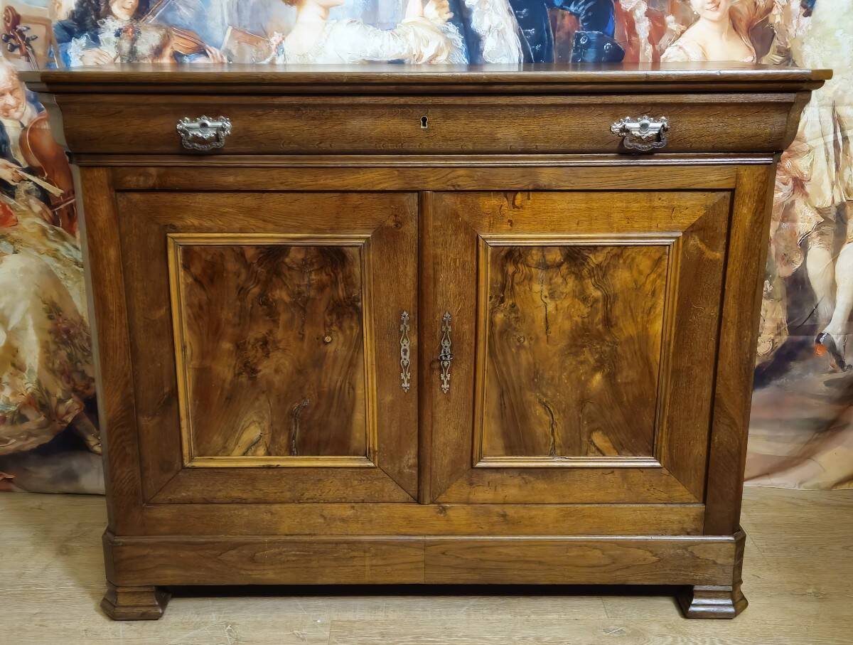 Low buffet with a curved front from the Louis Philippe period in walnut.