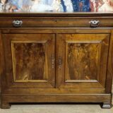 Low buffet with a curved front from the Louis Philippe period in walnut.