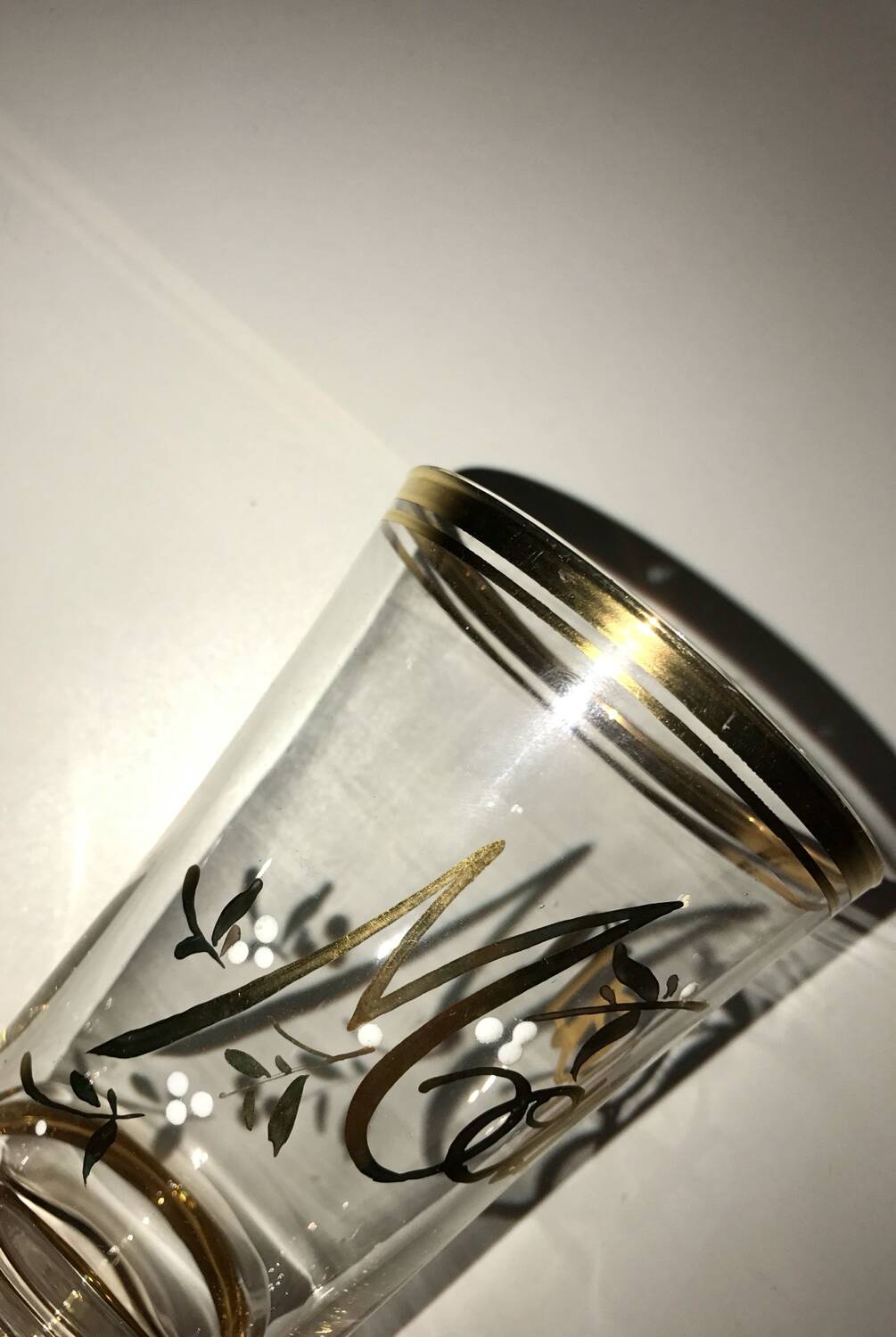 Antique gilded glass with the inscription Maman