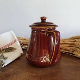 Vintage tea maker in old-fashioned country house-style earthenware