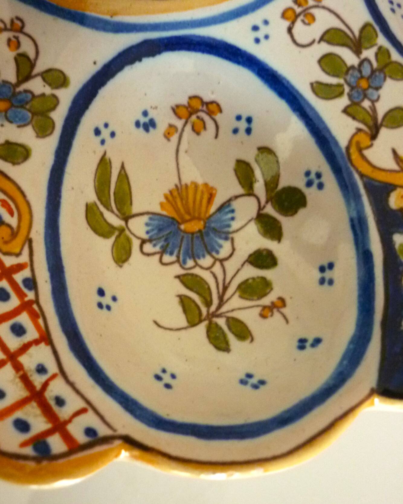 Dish, egg server in hand-painted earthenware, signed Geo Martel