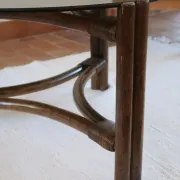 Round coffee table in rattan and smoked glass — 1970s