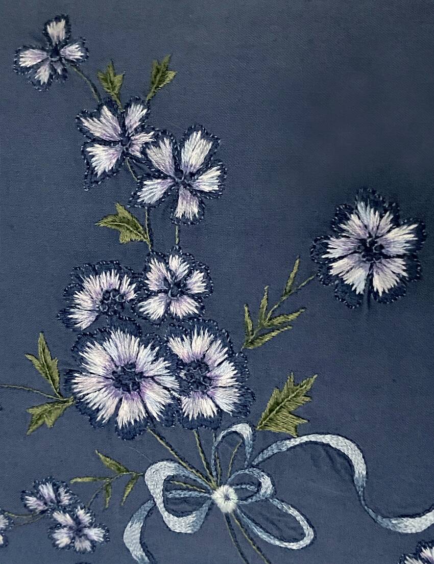 2 hand embroidered cushions