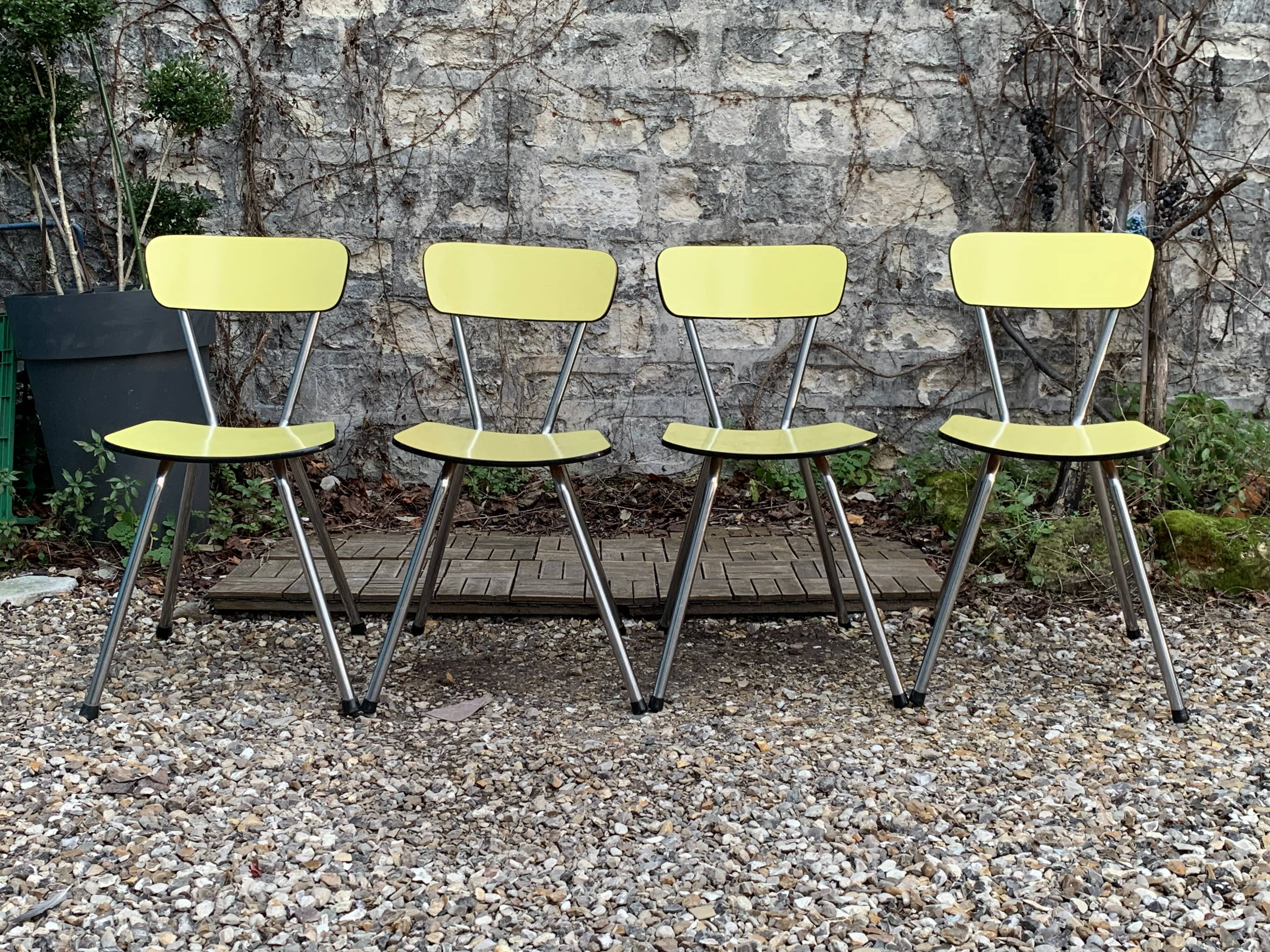 Yellow Formica chairs with compass legs, 1950s