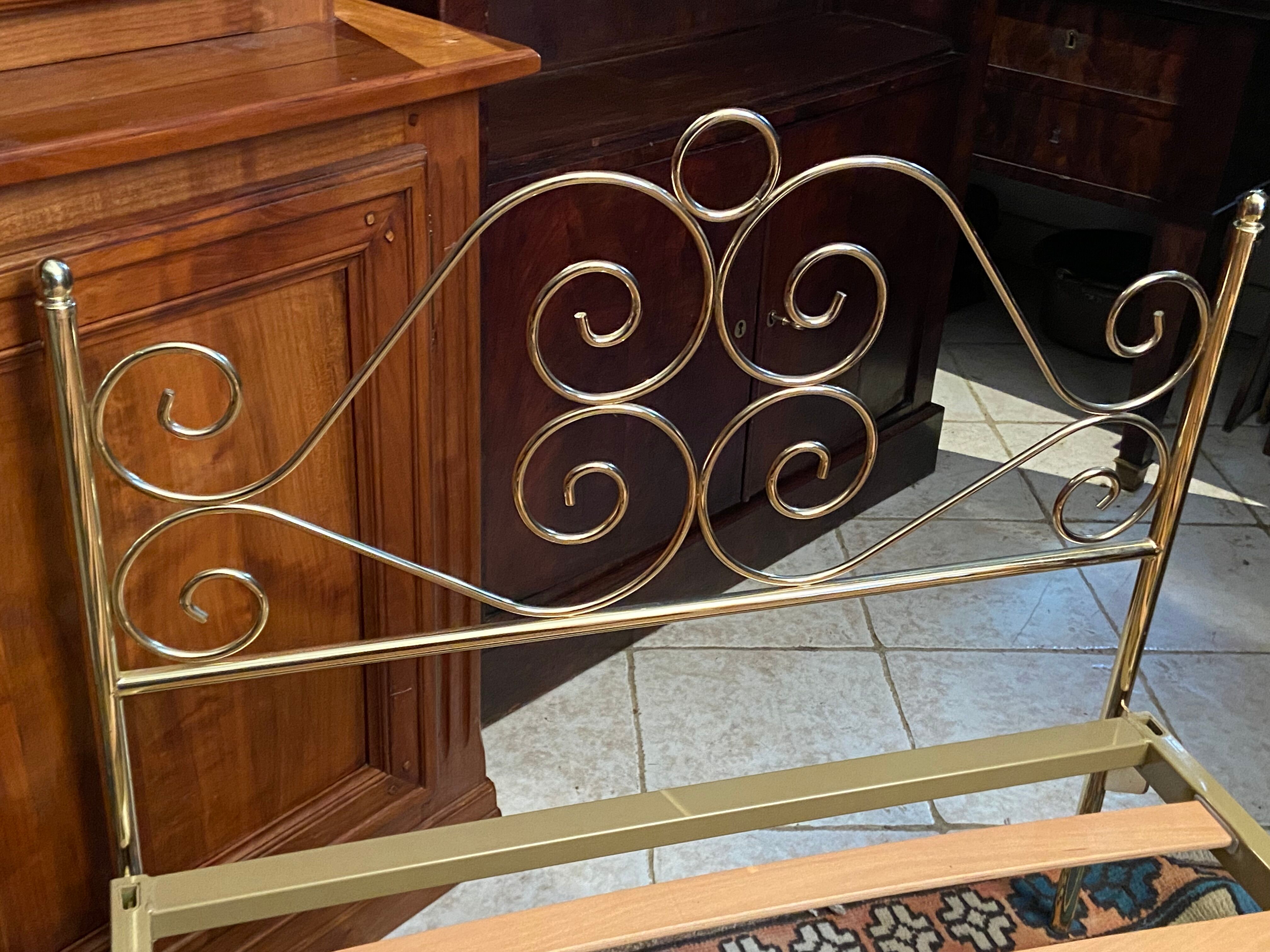 Romantic style single bed in brass with bedside table